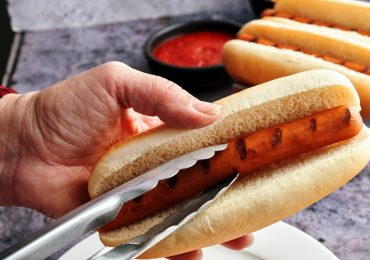 Just one hot dog a day could raise disease risk, study suggests, but some cite caveats