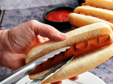 Just one hot dog a day could raise disease risk, study suggests, but some cite caveats