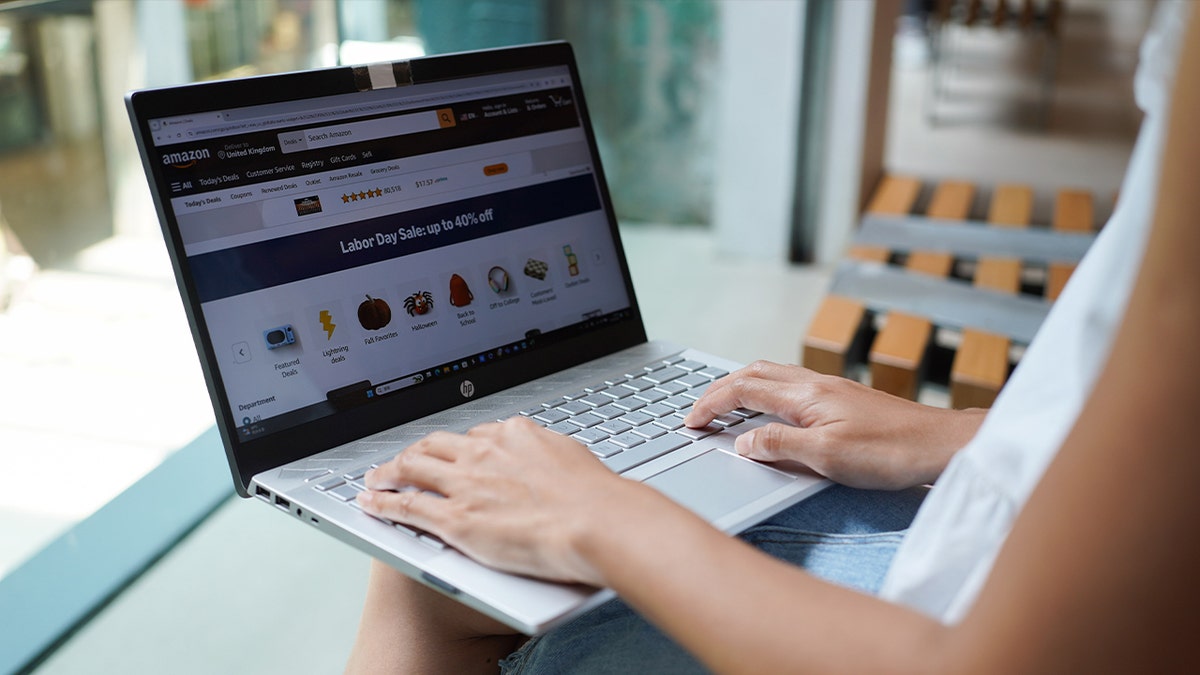 woman shopping online through amazon