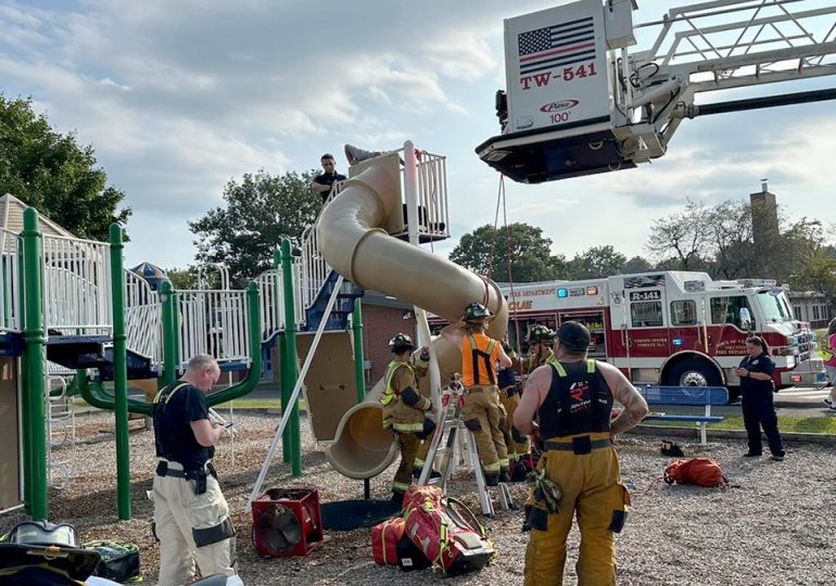 Firefighters cut open playground slide to rescue 40-year-old man stuck inside
