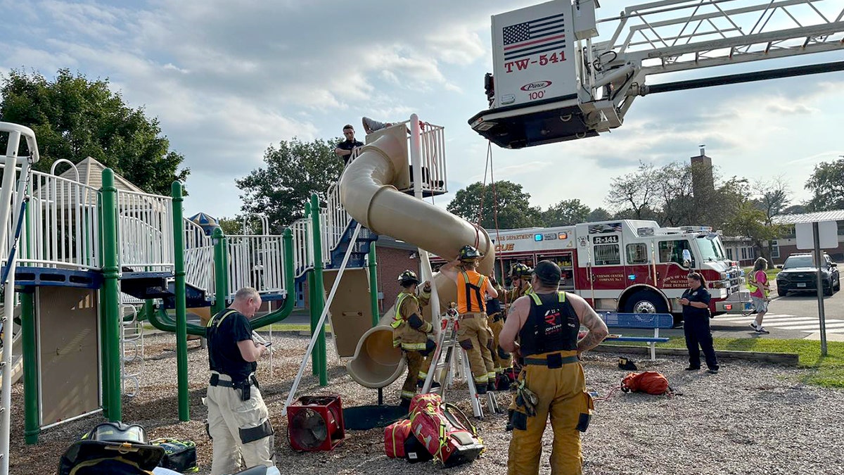 Firefighters cut open playground slide to rescue 40-year-old man stuck inside