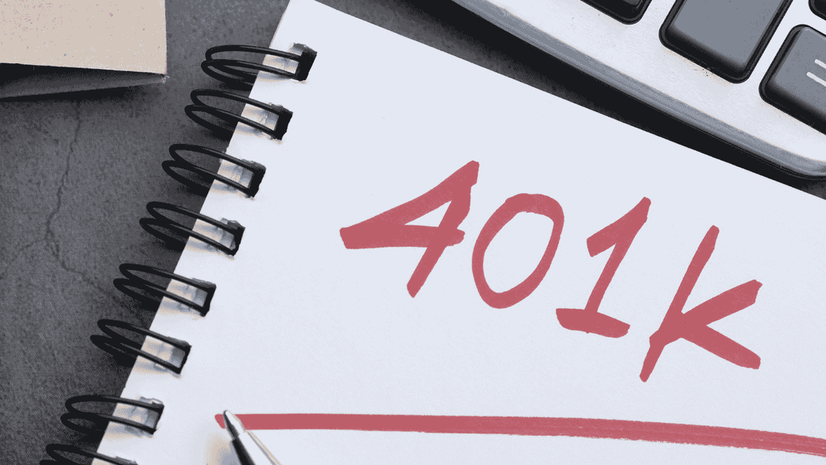 401(k) written on a tablet.