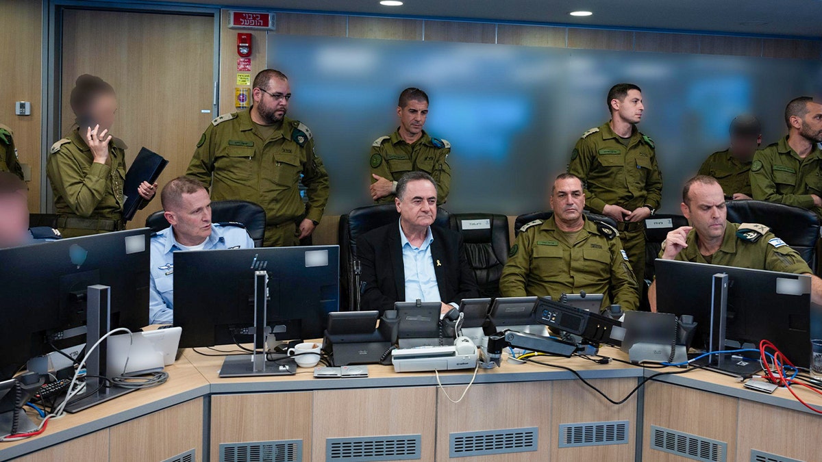 Israeli officials watch as strikes are carried out against Houthis