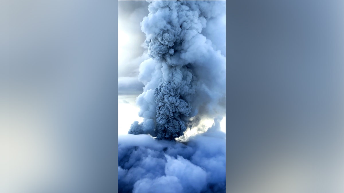 Ash and smoke rising above the Krasheninnikov volcano