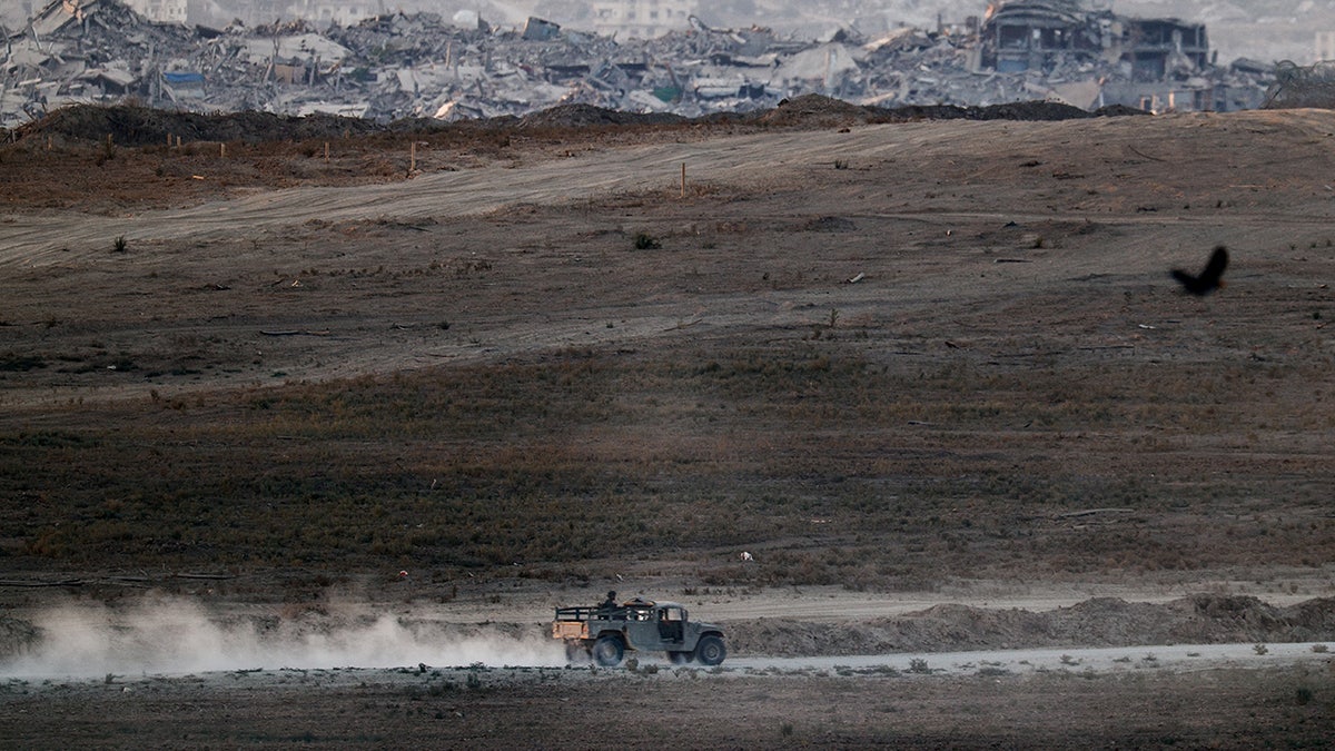 A military vehicle maneuvers in Gaza