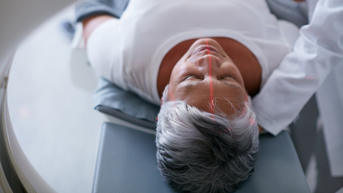 Woman getting brain scan for Alzheimer's