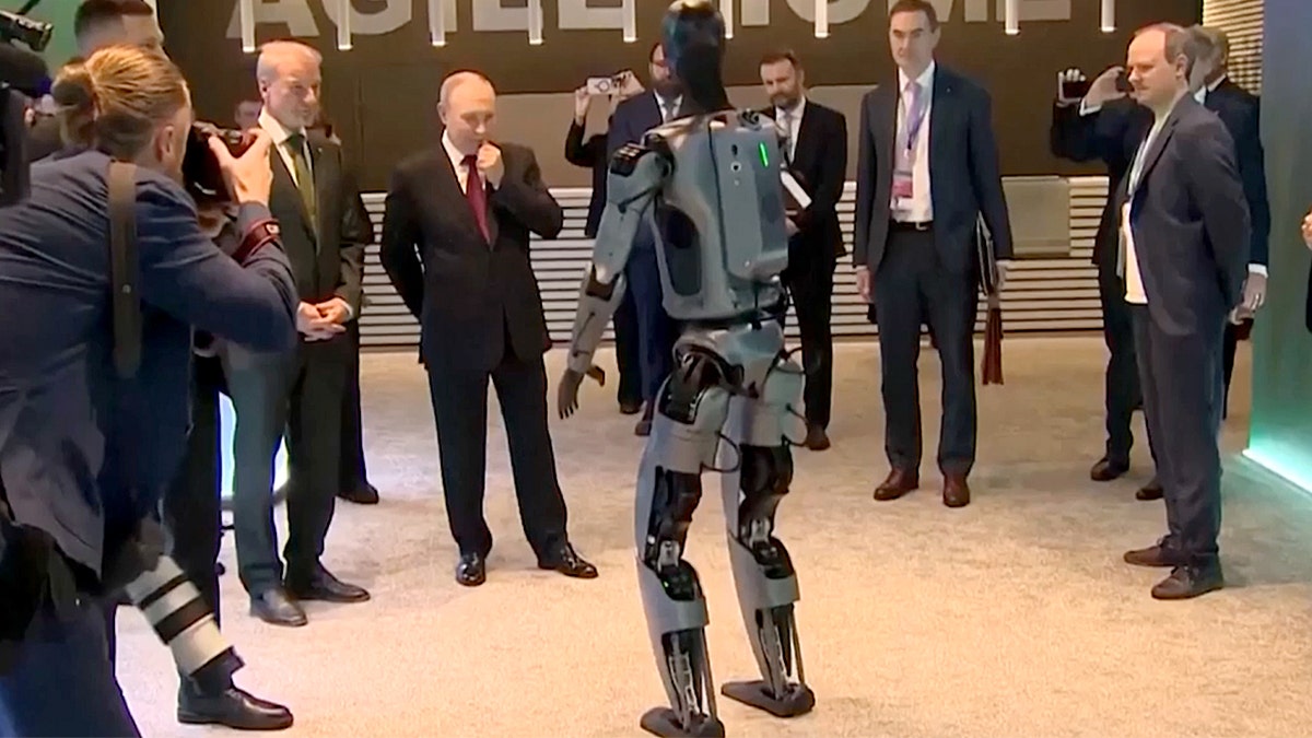 Putin watching a robot dance.