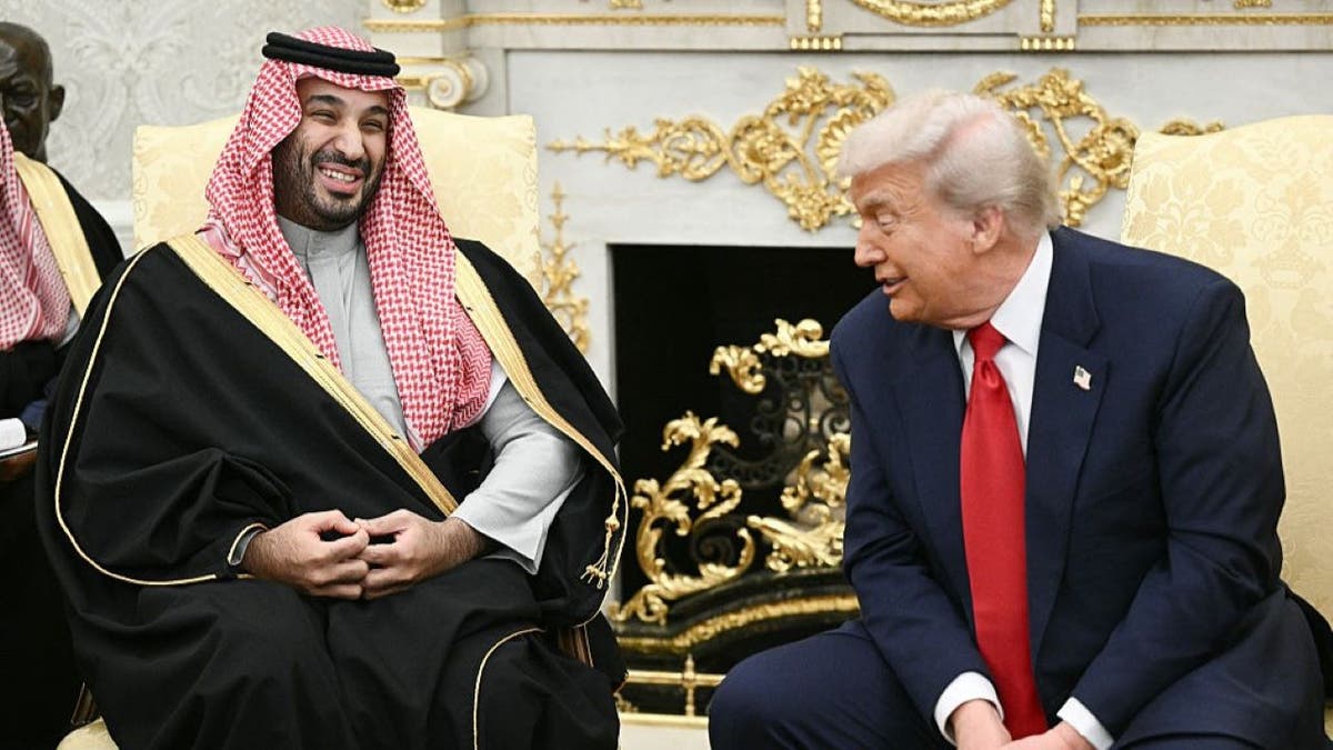 President Donald Trump sits with Mohammed Bin Salman in the Oval Office.