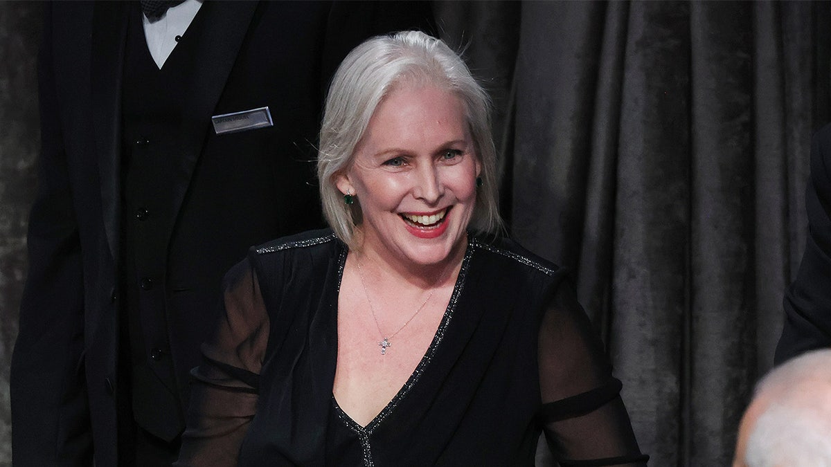 Kirsten Gillibrand wearing a black dress.