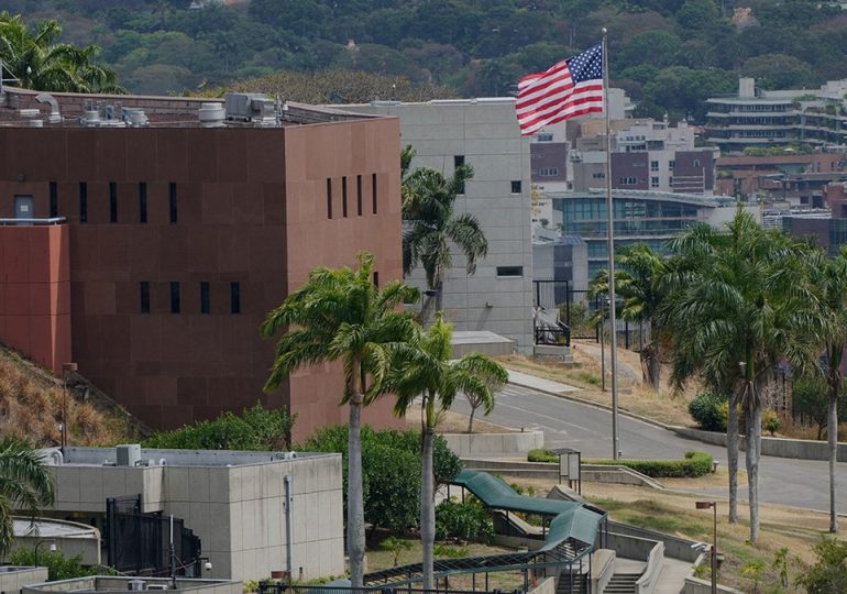 American flag raised, flies over US Embassy building in Venezuela for first time in 7 years