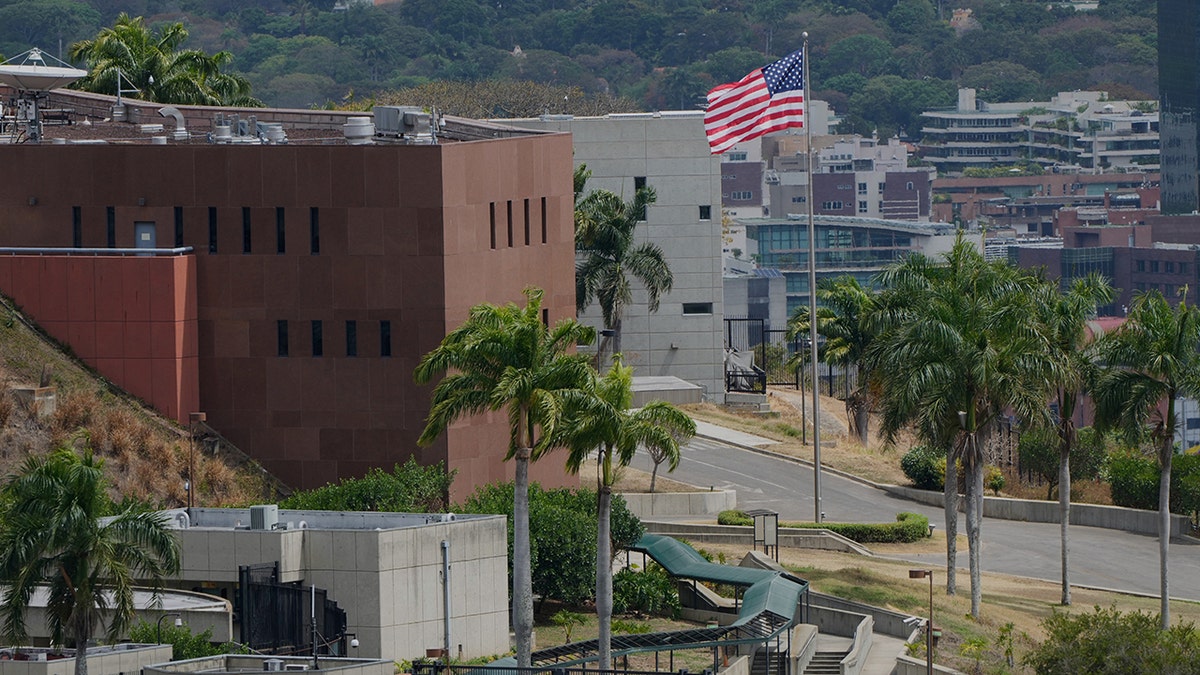 American flag raised, flies over US Embassy building in Venezuela for first time in 7 years