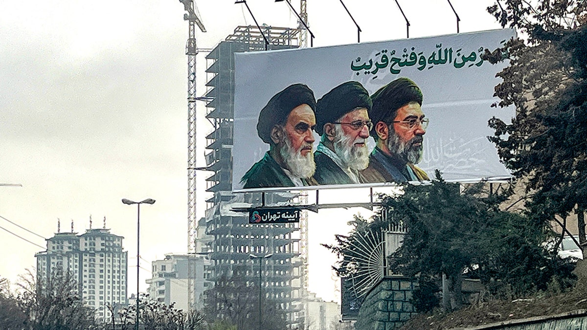 Billboard shows Iran's three supreme leaders.