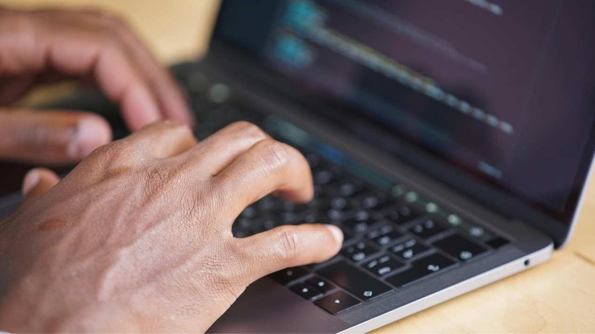 Kurt CyberGuy Knutsson typing on a computer keyboard
