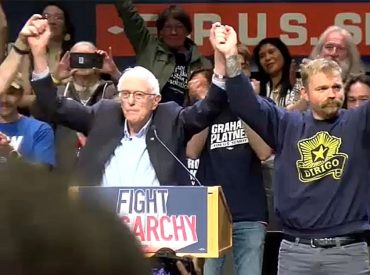 Maine Senate candidate Graham Platner embraces democratic socialism at Bernie Sanders rally in Portland
