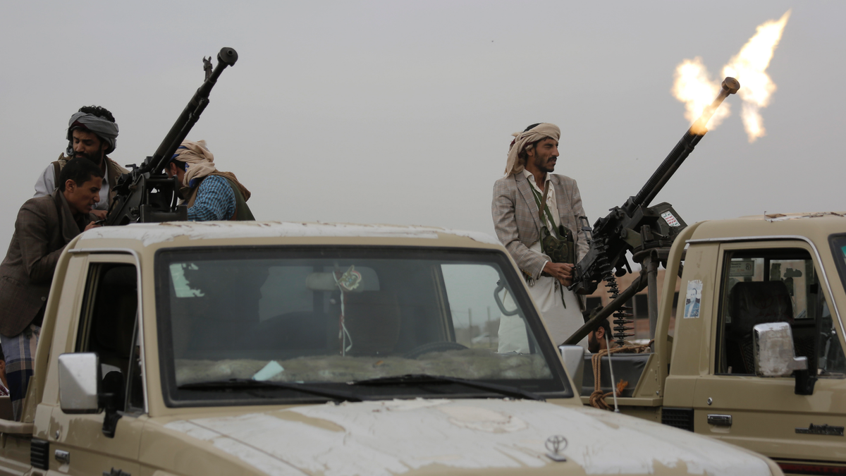 A Houthi rebel fighter fires in the air during a gathering aimed at mobilizing more fighters for the their movement, in Sanaa, Yemen, Thursday, Aug. 1, 2019. The conflict in Yemen began with the 2014 takeover of Sanaa by the Houthis, who drove out the internationally-recognized government. Months later, in March 2015, a Saudi-led coalition launched its air campaign to prevent the rebels from overrunning the country's south. (AP Photo/Hani Mohammed)
