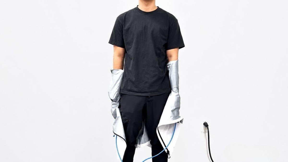 A person putting on self dressing clothes