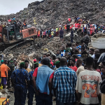 Massive garbage heap collapses onto homes, killing at least 30 as rescuers search for survivors