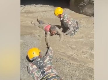 Trapped Nepali workers pulled from hydropower tunnel after catastrophic flooding