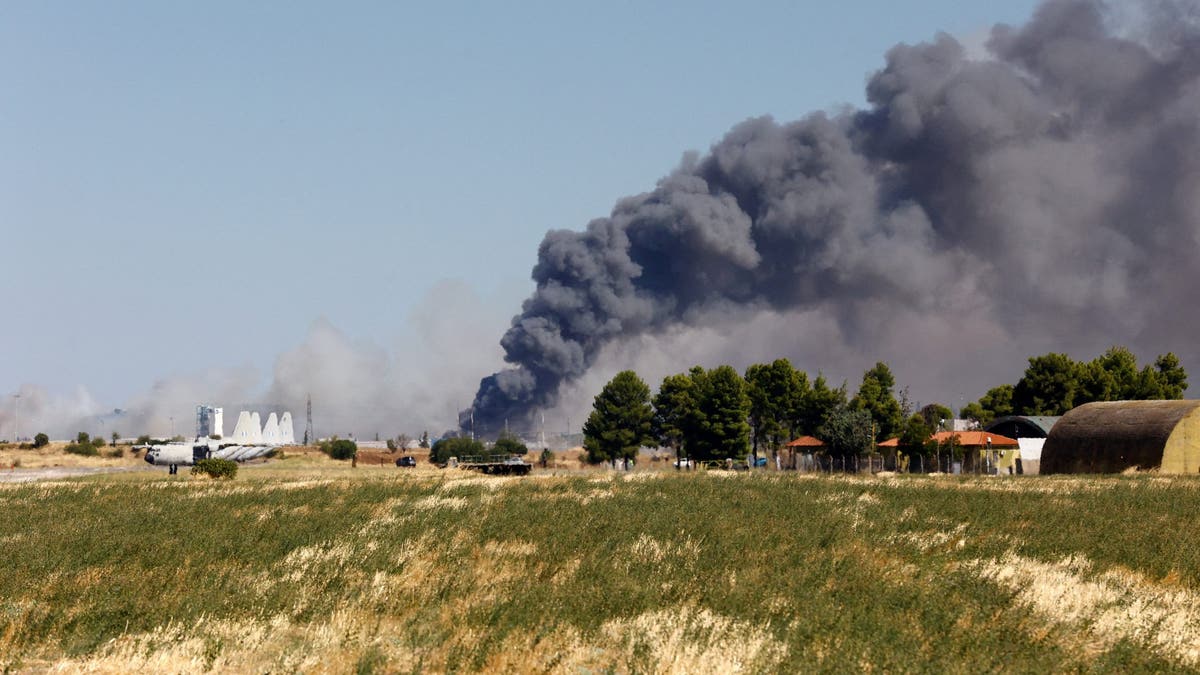 Smoke rises following a Greek F-4 Phantom fighter jet crash in Tanagra, Greece.