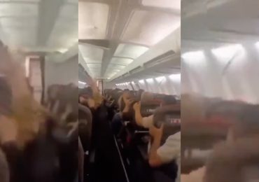 Plane passengers scream in harrowing mid-flight video as violent shaking sends cabin ceiling panels flying
