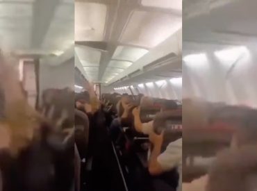 Plane passengers scream in harrowing mid-flight video as violent shaking sends cabin ceiling panels flying