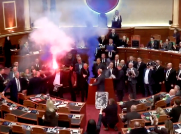Albanian opposition lawmakers disrupt parliament with smoke flares and furious attacks on socialist PM
