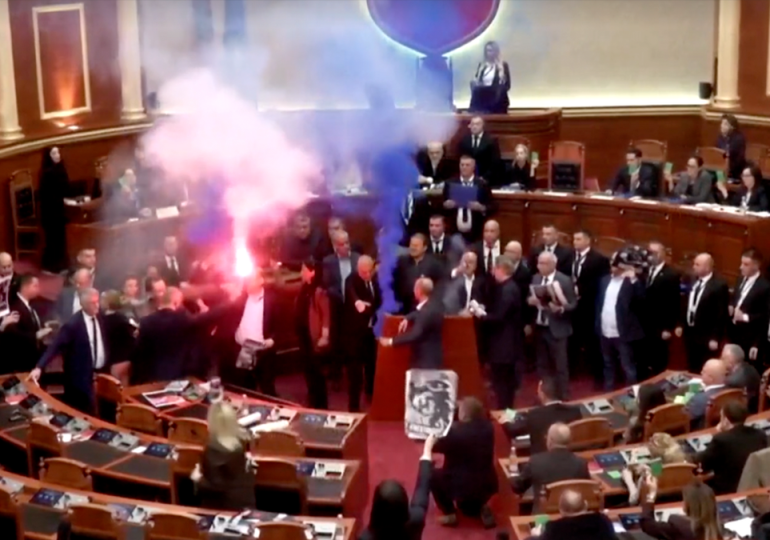 Albanian opposition lawmakers disrupt parliament with smoke flares and furious attacks on socialist PM