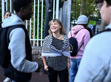 Greta Thunberg joins massive French student protests as cars burn, police fire tear gas