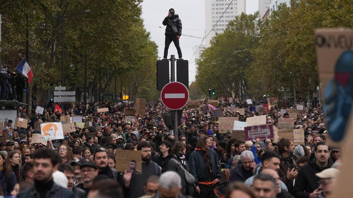 Nearly 1,000 arrested across France as police find potential weapons on protesters: officials